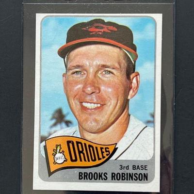 1965 Topps #150: Brooks Robinson. Elected to the HOF in 1983 he played entire 23-year career with the Baltimore Orioles, winning two...