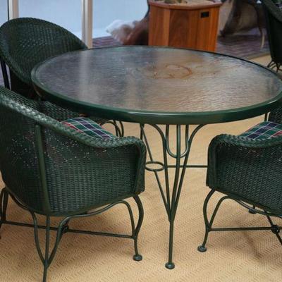 Two sets of this very nice resin wicker look umbrella table with four chairs. 