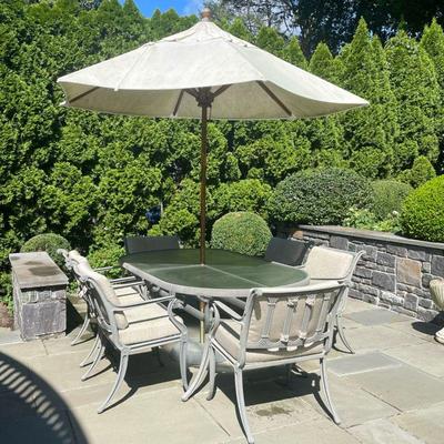 (8PC) BROWN JORDAN PATIO DINING SET | Including; 6 Brown Jordan cushioned dining chairs, oval glass top dining table, and Brown Jordan...