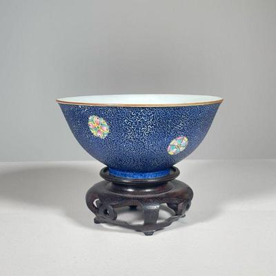 CHINESE PORCELAIN BOWL | Exterior painted with pink, green, and yellow medallions on blue ground. - h. 3 x dia. 7 in 