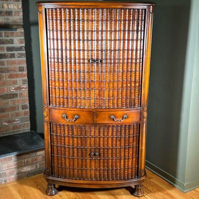 SHERRILL OCCASIONAL TV CABINET | Mahogany cabinet with faux book carving relief on sliding doors to reveal media cabinet with 2 drawers....