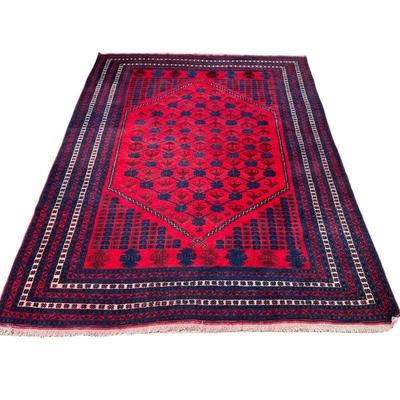 AFGHAN/BELOUCH CARPET | Worked with a stylized floral motif and five borders in shades of red, brown, navy blue, and white. - l. 118 x w....