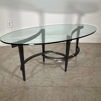 CHARLESTON FORGE COCKTAIL TABLE | Oval glass top coffee table with modern wrought iron base by Charleston Forge. - l. 50 x w. 26 x h. 18 in 
