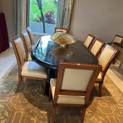 Dining room table and chairs.  Chairs alone were $18000. Have bill to prove it. and the table was $10,000.  Taking offers on this set