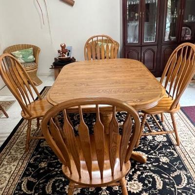 Oak dining table & chairs