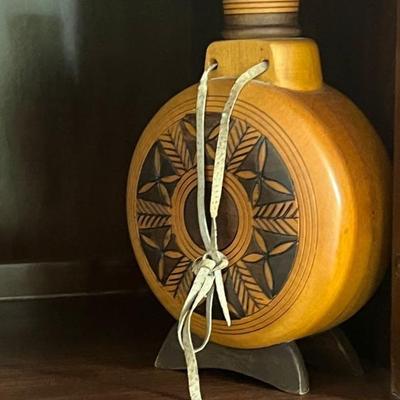 Carved wooden flask