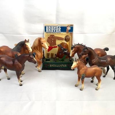 RIHI204 Vintage ShowJumper Bank And More	Cast iron ShowJumper bank, 6 plastic horses made by Breyer Molding Co. And a Brenda Breyer...