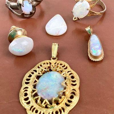 RIHI962 Vintage Opal Stone Lot	6 opals - 2 rings, 2 pendants, 1 earring, and I loose Opal stone.Â Long tear drop shaped pendant passed...