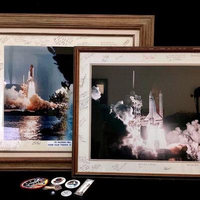 RIHI916 Space Shuttle Memorabilia	2 framed space shuttle launch pictures surrounded with signatures on mats. Â 2 NASA buttons, 1 85...