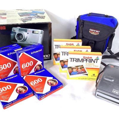 GRLE912 Vintage Polaroid Film & Cameras	Ricoh ROC-5300 digital camera in original box with manuals, VHS, and cords sealed in original...