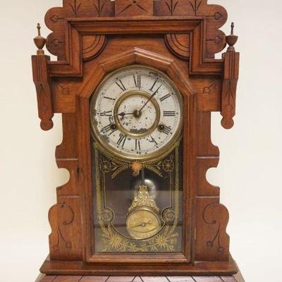 1299	ANTIQUE WALNUT GINGERBREAD KITCHEN CLOCK, APPROXIMATELY 23 IN HIGH
