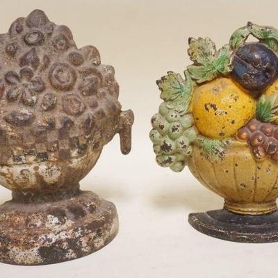 1162	2 CAST IRON FLORAL BASKET DOOR STOPS, APPROXIMATELY 8 IN HIGH
