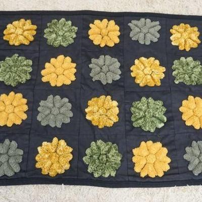 1116	SMALL HAND SEWN RAISED PUFFY QUILT, APPROXIMATELY 4 FT 5 IN X 2 FT 7 IN
