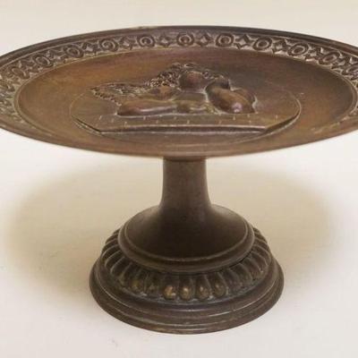 1024	BRONZE TAZZA W/EMBOSSED CHERUBS AT TOP, APPROXIMATELY 8 IN X 4 1/4 IN HIGH
