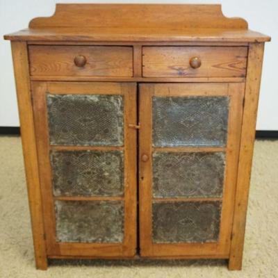 1290A	COUNTRY PINE PIE SAFE W/2 DRAWERS & 2 DOORS W/TIN PIERCED PANELS, SOME LOSS TO LEFT REAR LEG, APPROXIMATELY 46 IN S 16 IN S 55 IN
