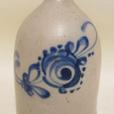 1075	STONEWARE BLUE DECORATED JUG, CRACK AT BASE, APPROXIMATELY 11 3/4 IN HIGH
