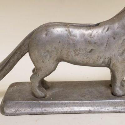 1166	ALUMINUM DOG NUTCRACKER, APPROXIMATELY 12 IN X 3 IN X 6 IN
