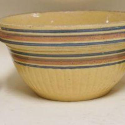 1154	LOT OF 3 YELLOWARE BOWLS W/BLUE & BLUE & SALMON COLOR BANDS, LARGE BOWL HAS RIM CHIP, LARGEST APPROXIMATELY 11 IN X 6 IN HIGH

