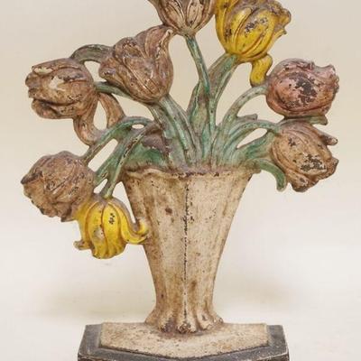 1163	CAST IRON TULIPS IN BASKET DOOR STOP, APPROXIMATELY 10 IN HIGH
