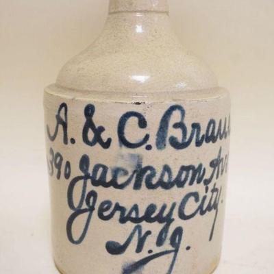 1077	STONEWARE JUG A&C BRAUER JERSEY CITY NJ, APPROXIMATELY 9 1/2 IN HIGH
