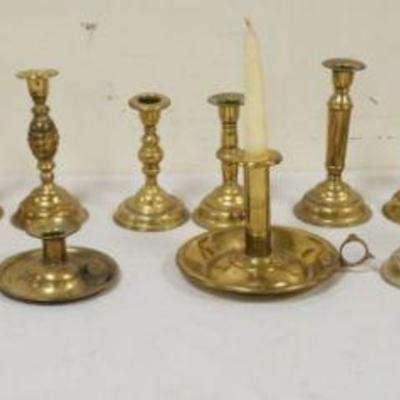 1310	LOT OF BRASS CANDLESTICKS INCLUDING 9 PAIRS & ONE PUSH UP, TALLEST APPROXIMATELY 7 1/4 IN HIGH

