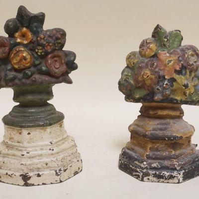 1161	2 SMALL FLORAL BASKET CAST IRON DOOR STOPS, APPROXIMATELY 7 1/4 IN HIGH
