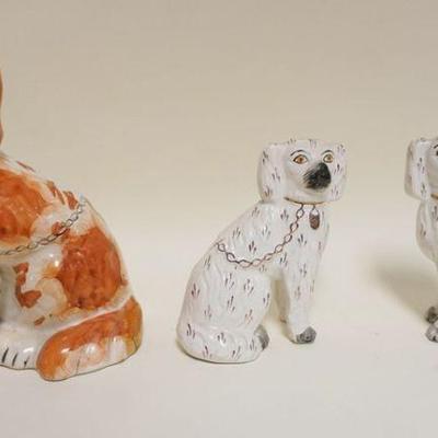 1206	3 STAFFORDSHIRE DOGS, ONE PAIR, LARGEST APPROXIMATELY 10 IN HIGH
