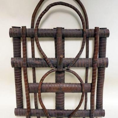 1131	RUSTIC ADIRONACK TWIG HANGING HAT RACK IN THE FORM OF HORSESHOES, APPROXIMATELY 15 IN X 22 IN
