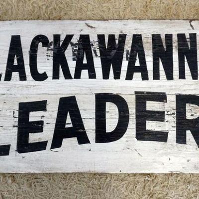 1232	DOUBLE SIDED WOOD SIGN *LACKAWANA LEADER*, APPROXIMATELY 19 IN X 37 IN
