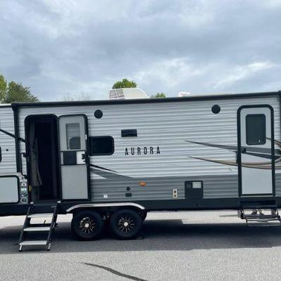 2022 Forest River Aurora 28bhs - Sleeps 6 Length- 32â€™ Dry weight- 7,600 lbs. Electric jack Everything works as it should. Recently had...