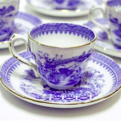 Lot 066  Cups and Saucers Fisherman Pattern