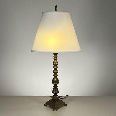 BRASS TRIANGULAR TABLE LAMP | Turned brass lamp with triangular base. - h. 24 in (Overall with shade) 
