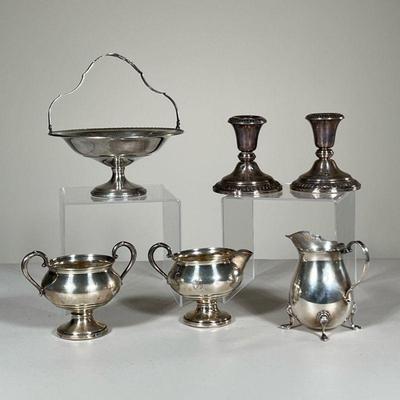(6PC) MISC. STERLING SET | Including two candlesticks, a chalice, two pitchers, and a handled dish. - h. 3 x dia. 6.5 in (largest) 