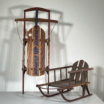 (2PC) ANTIQUE INFANT & TODDLER SLEDS | Including; baby sled with slatted wood back, spindle railings, and iron skis on bottom, and...