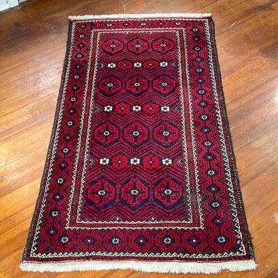 IRANIAN PATTERNED RUG | Overall pattern on a red field. - l. 79 x w. 43.5 in 