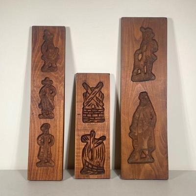 (3PC) WOODEN COOKIE MOLDS | Hollow relief antique cookie molds made of carved wood, showing figures dressed in large clothing and...