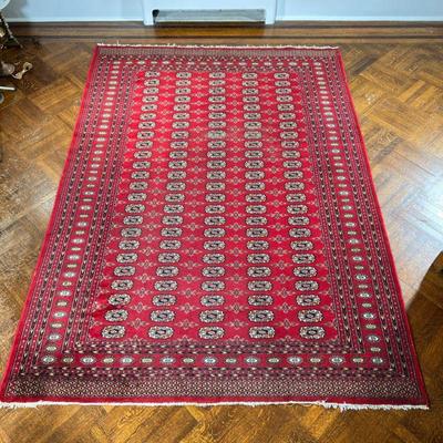 RED GEOMETRIC RUG | Having geometric medallions on red background. - l. 106 x w. 74 in 