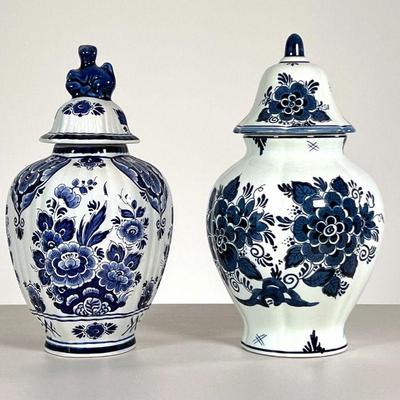 (2PC) DELFT JARS | Two lidded jars, one with a lion form finial. - h. 10.75 x dia. 6 in 