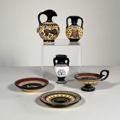 (6PC) GREEK POTTERY | Copies of ancient Greek pottery, including a picture, two urns, a candle holder, and two small plates. - h. 4.25 x...