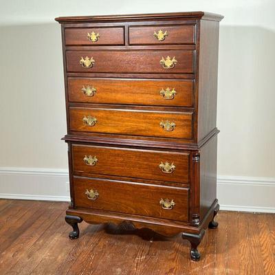 CHIPPENDALE CHEST OF DRAWERS | Tall dresser with two half drawers over 5 full width graduated drawers with shell and column carvings. -...