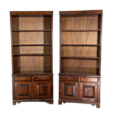 (2PC) PAIR PLYMWOOD SUGARHILL PINE BOOKCASES | With open shelves over two drawers over double doors. - l. 36 x w. 13 x h. 80 in 