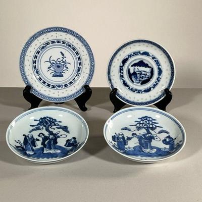 (4PC) CHINESE DISHES | Including two similar low dishes with identical scenes hand-painted in under glazed blue, one with mark on bottom,...