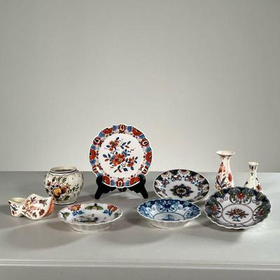 (9PC) MAKKUM AND DELFT | Including 5 small plates/dishes, two bud vases, a lobed vase, and a small shoe. - dia. 6 in (Largest plate) 