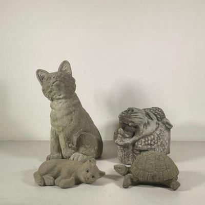 (4PC) CONCRETE ANIMAL FIGURINES | Including; Fox, raccoon, lions head, cat, and small turtle. - l. 8 x w. 7 x h. 14 in (largest (Fox) 