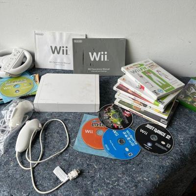 Nintendo Wii Console With Assortment Of Games And Fitness Programs
