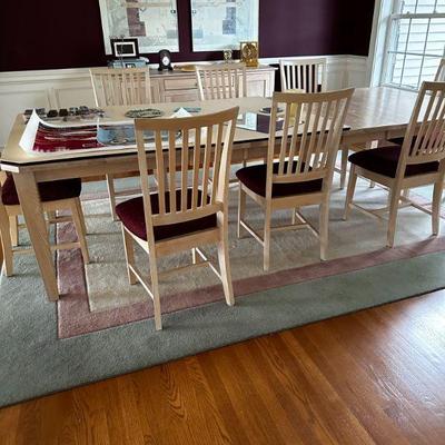 dining room table with 3 leaves, 8 chairs and pads