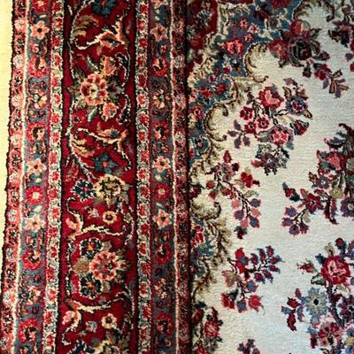 10x13 handmade Persian rug, wool; red, pink and black on an ivory ground
