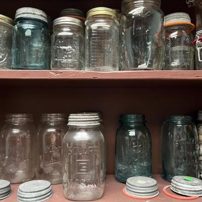 Tons of antique mason jars with glass lined, zinc lids