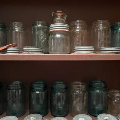 Tons of antique mason jars with glass lined, zinc lids