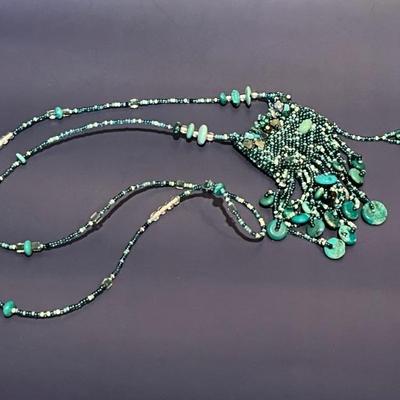 Vintage costume jewelry, many pieces from India, Africa, Mexico, as well as Native American and Alaskan pieces, tons of necklaces,...